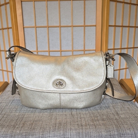 Coach Handbags - Coach Metallic Leather Flap Duffle Bag